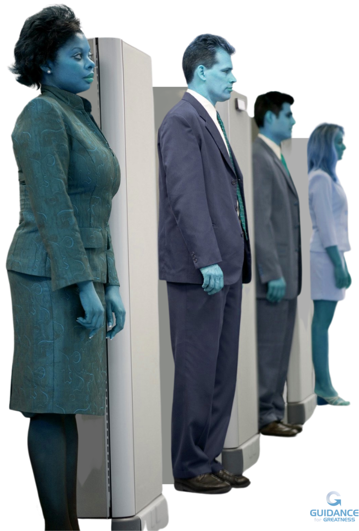 photo of four businesspeople lined up in front of cubicle entries. they are dressed in suits, and their skin is tinted blue. they all stand at attention looking forward with a blank look.