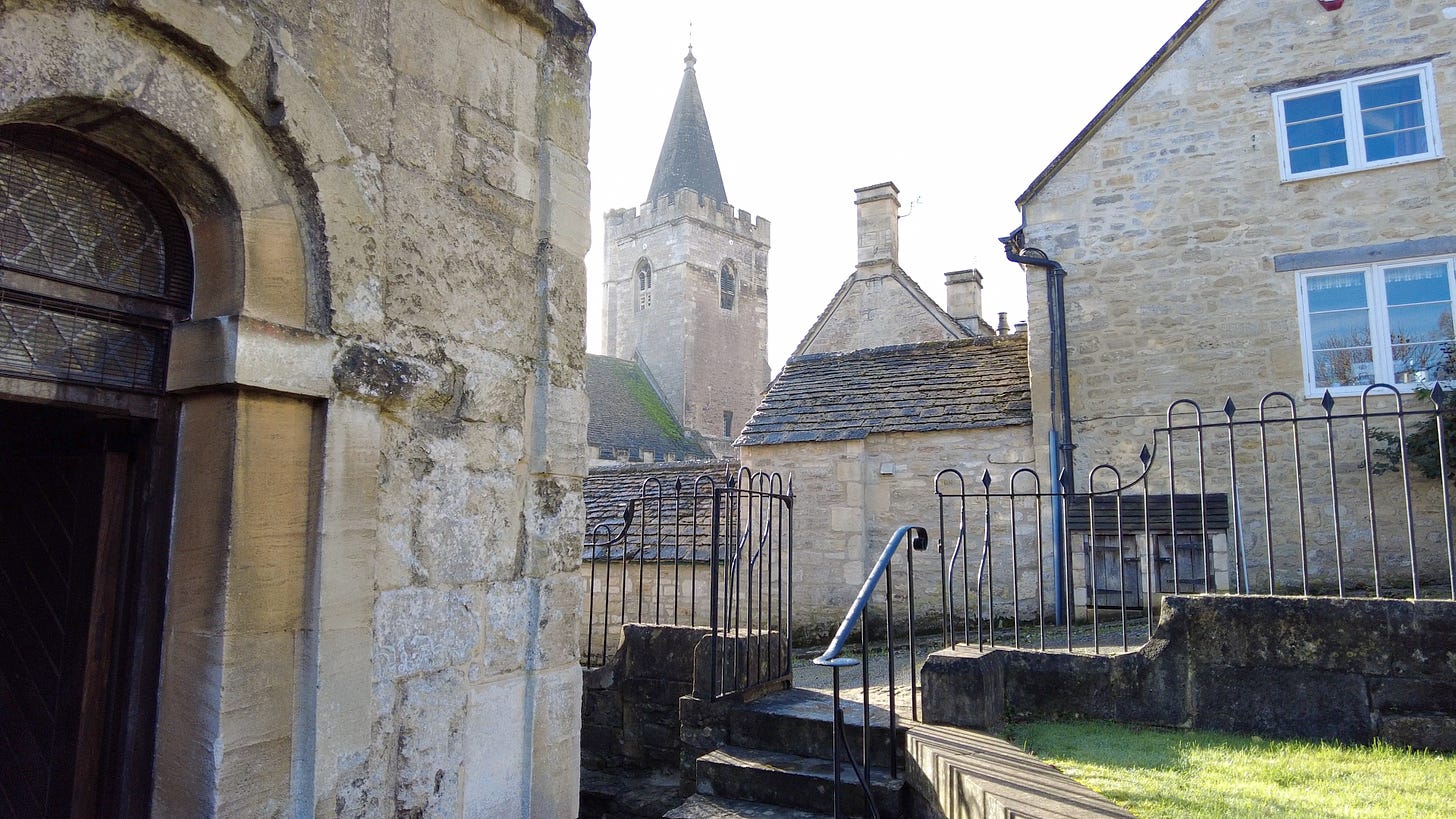 A view from the rear of St. Laurence Church looking at the tower of Holy Trinity Church, Bradford on Avon.