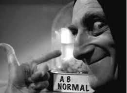 May be a black-and-white image of text that says 'AB B NORMAL'