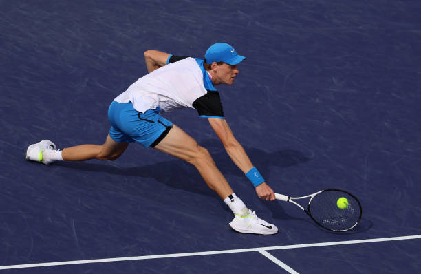 Jannik Sinner of Italy plays a backhand volley against Jan-Lennard Struff of Germany in their third round match during the BNP Paribas Open at Indian...