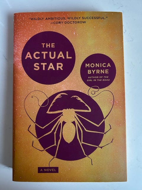 The actual star by monica byrne includes a drawing of a giant spider on the cover. The actual star by monica byrne includes a drawing of a giant spider on the cover.