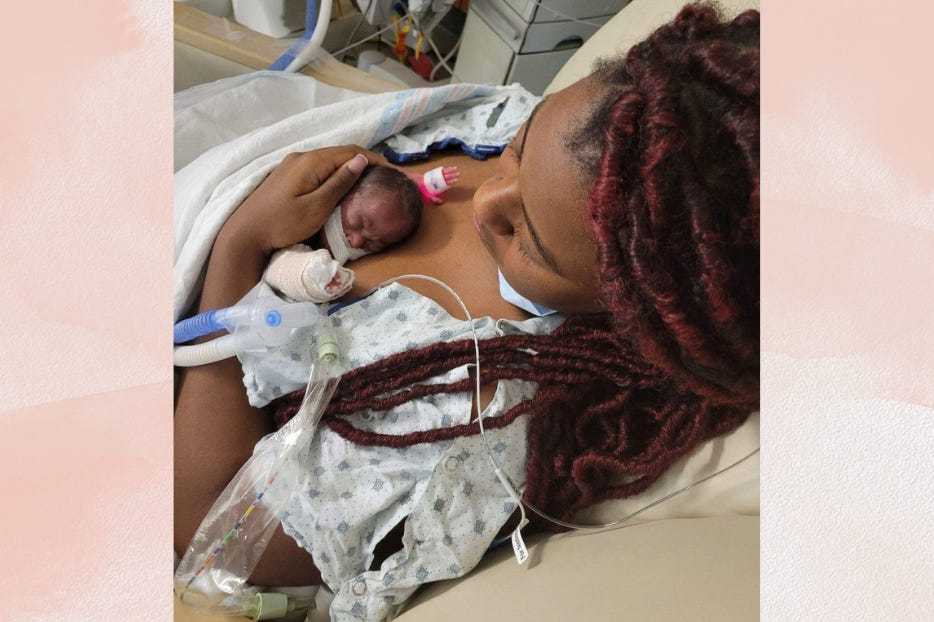 Kimberly holds her tiny girl on her chest inside the NICU at Hillcrest Hospital. 