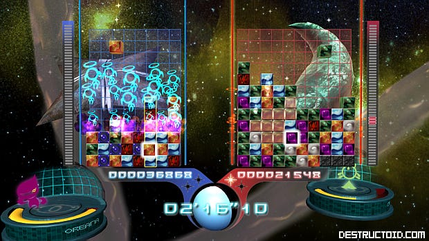 A screenshot showing what Meteos Wars looked like on the Xbox 360, with multiple playing areas shown side-to-side, and still multiple things to look at, but not quite as much as on the DS.