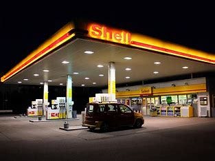 Image result for shell gas station at night