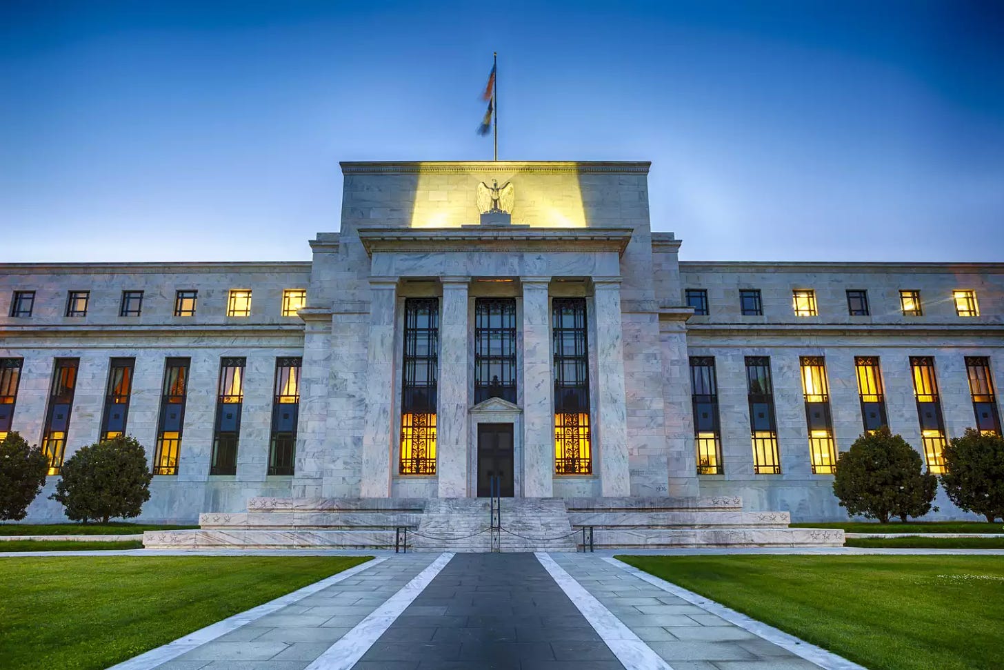 The Federal Reserve Building in downtown Washington DC, USA at night.