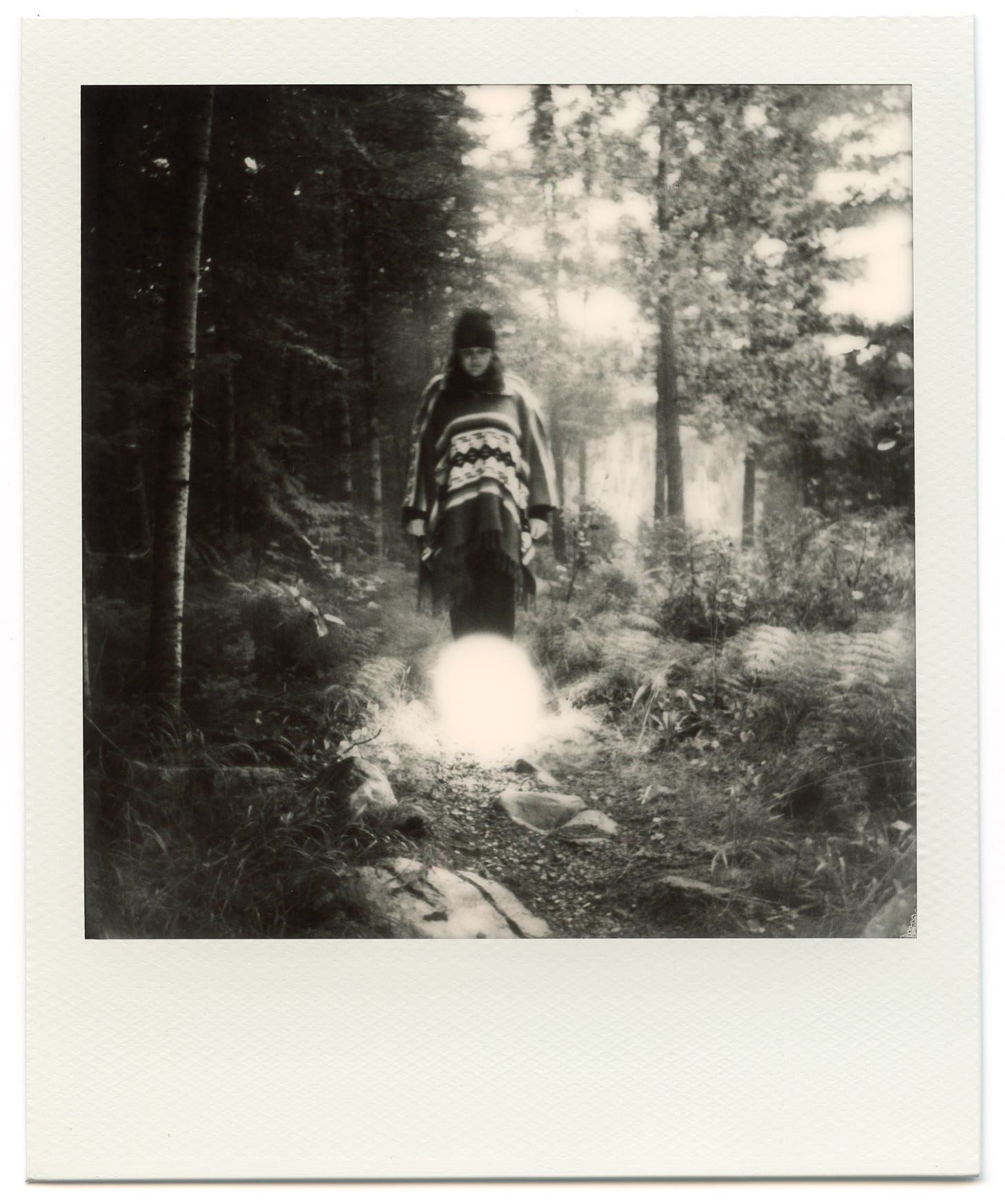 Woman with Orb in the Woods