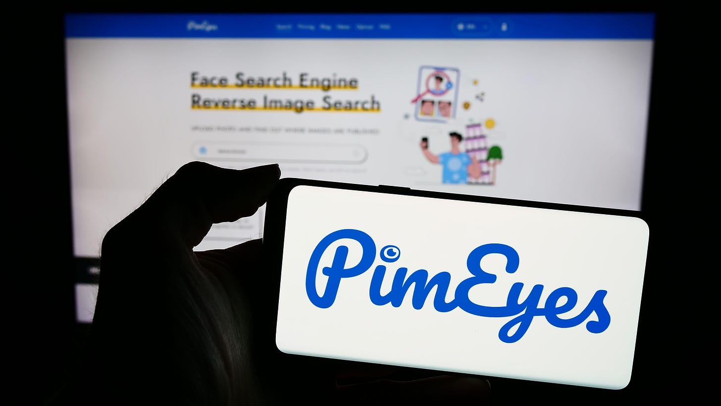 This is a picture of someone using PimEyes, an advanced face recognition search engine