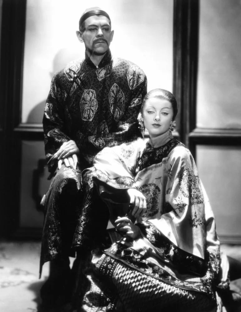 the actors appear in Chinese robes in yellowface