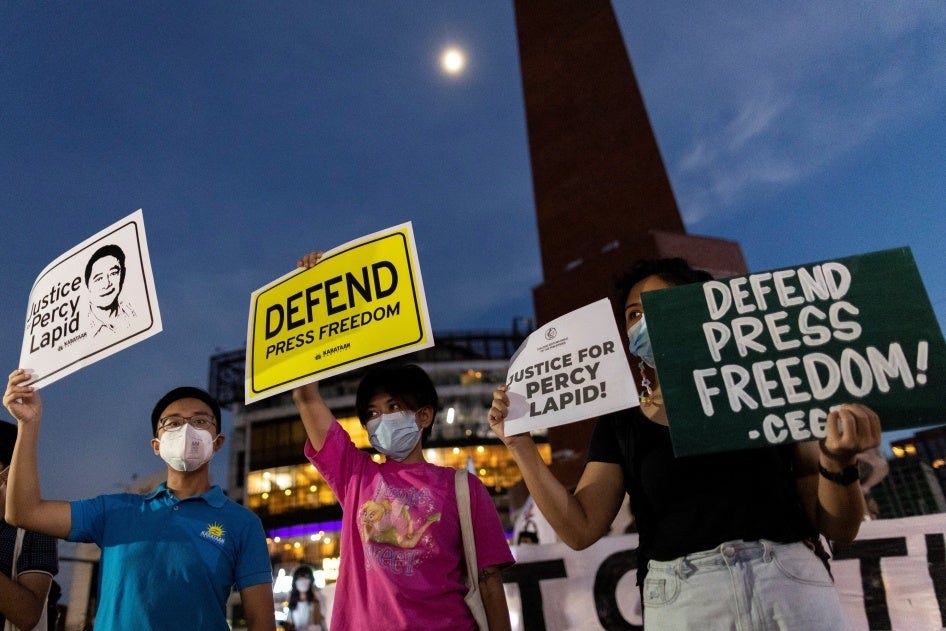 Activists call for justice and protection of media workers during a rally following the killing of radio journalist Percy Lapid, Quezon City, Philippines, October 4, 2022. 