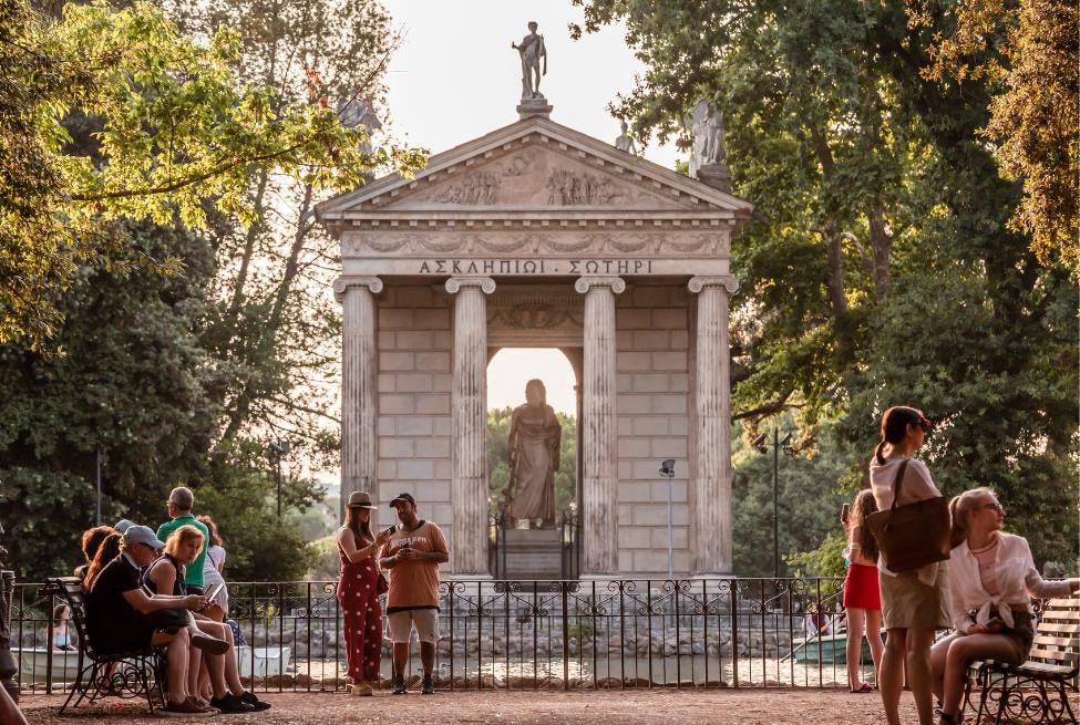 Travelers explore the Villa Borghese.