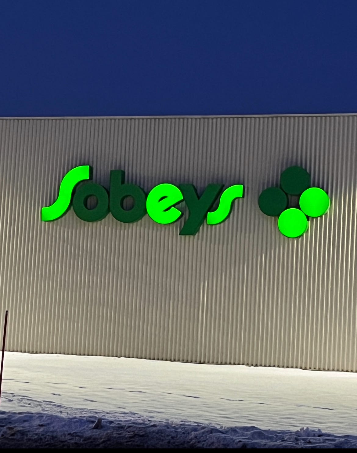 The sign on the Sobeys grocery store near my house. The letters O, B, and Y are burnt out, so it says Ses