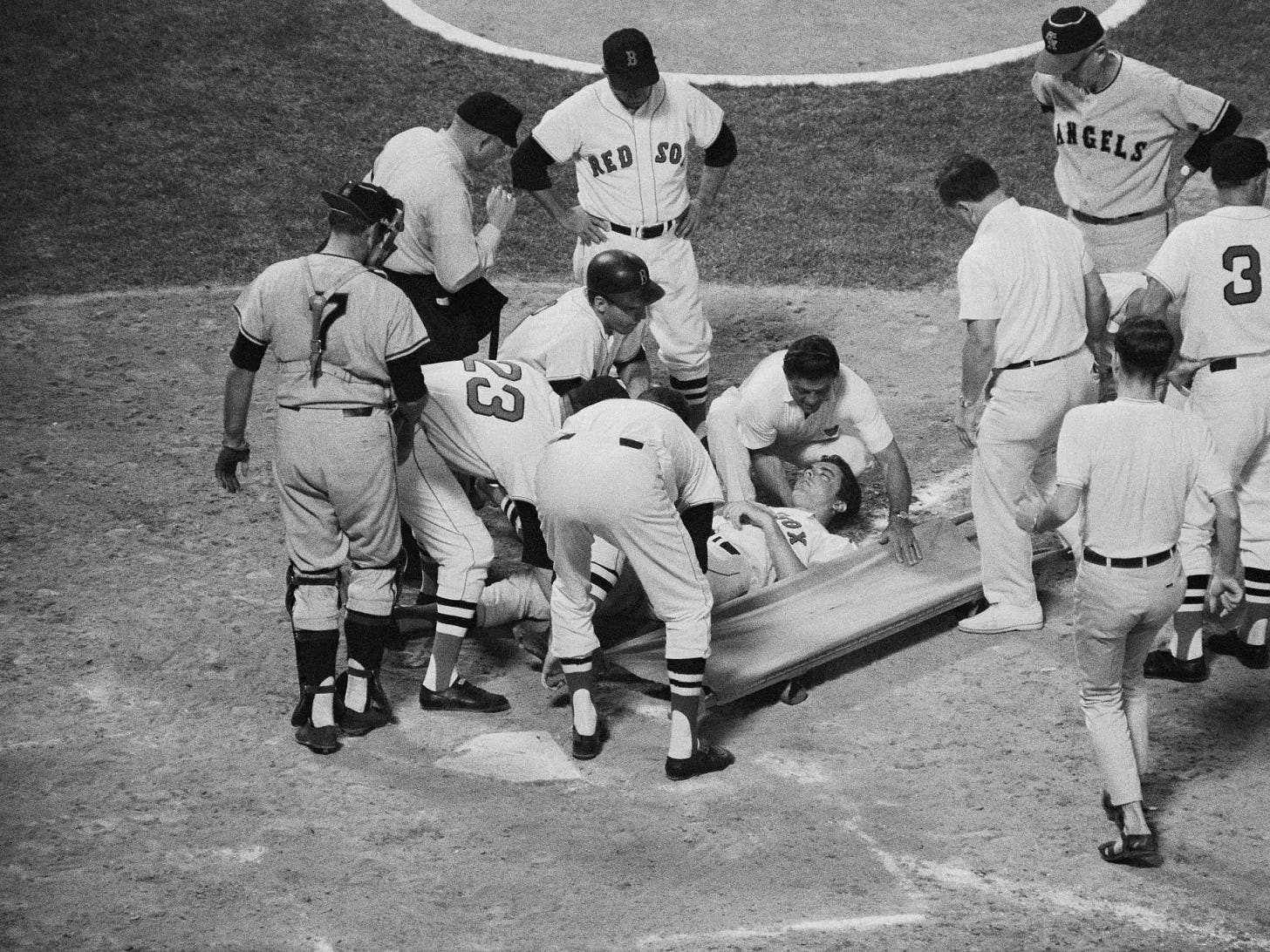 Tony Conigliaro is moved to a stretcher after being hit in the head by a pitch.