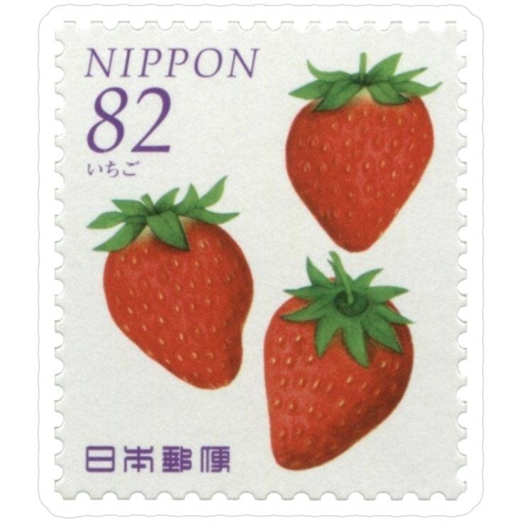 This may contain: a postage stamp with three strawberries on it's front and the number 822 written in chinese