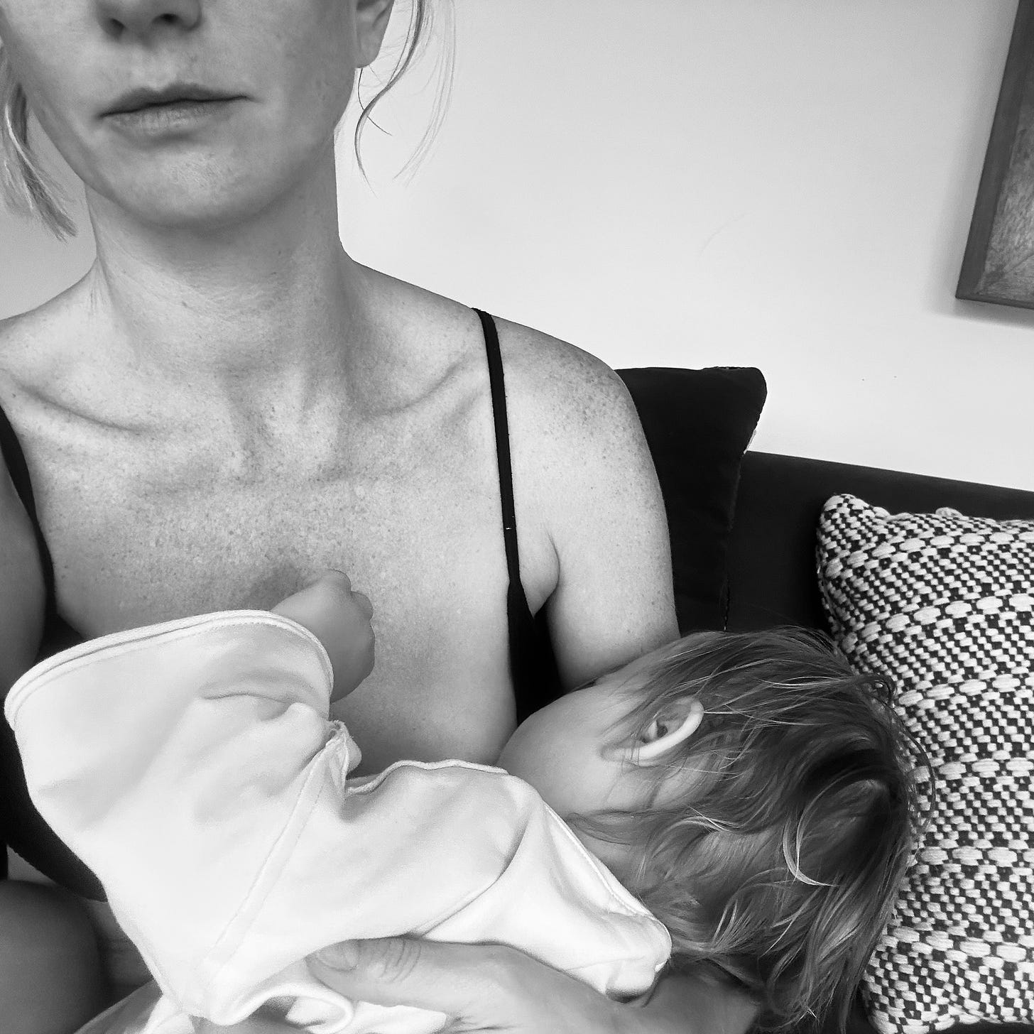 Ashley Lowe and her daughter breastfeeding