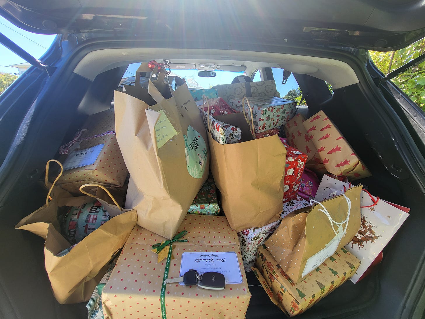 Picture of gifts in a car for Shoebox Christmas