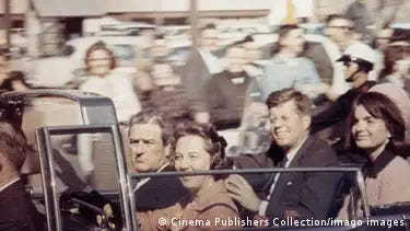 Picture of Texas Governor John Connally, Nellie Connally, President John F. Kennedy, and Jacqueline Kennedy in an open-top presidential limousine.