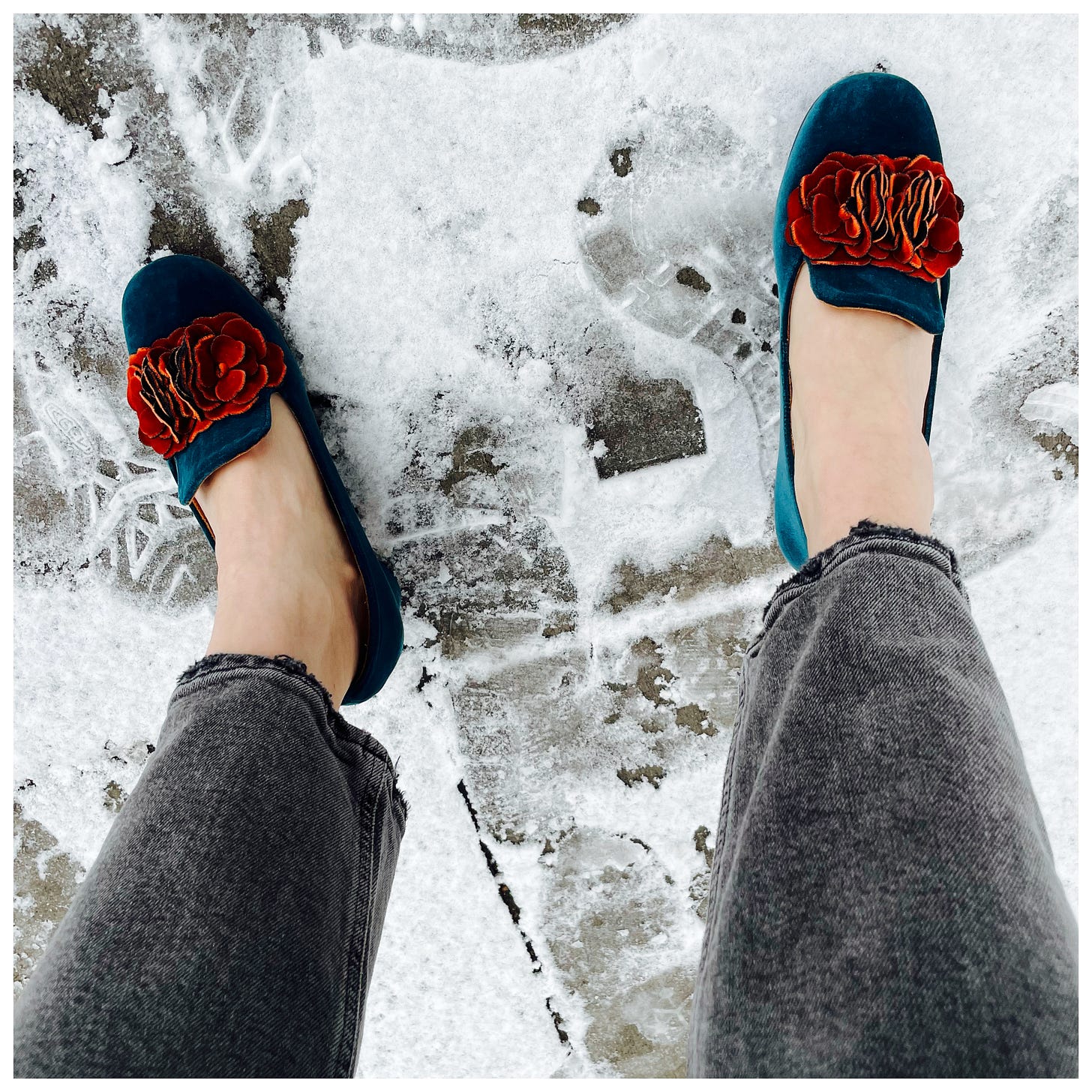 Photo of my velvet shoes and no socks, standing outside in the snow in Denver.