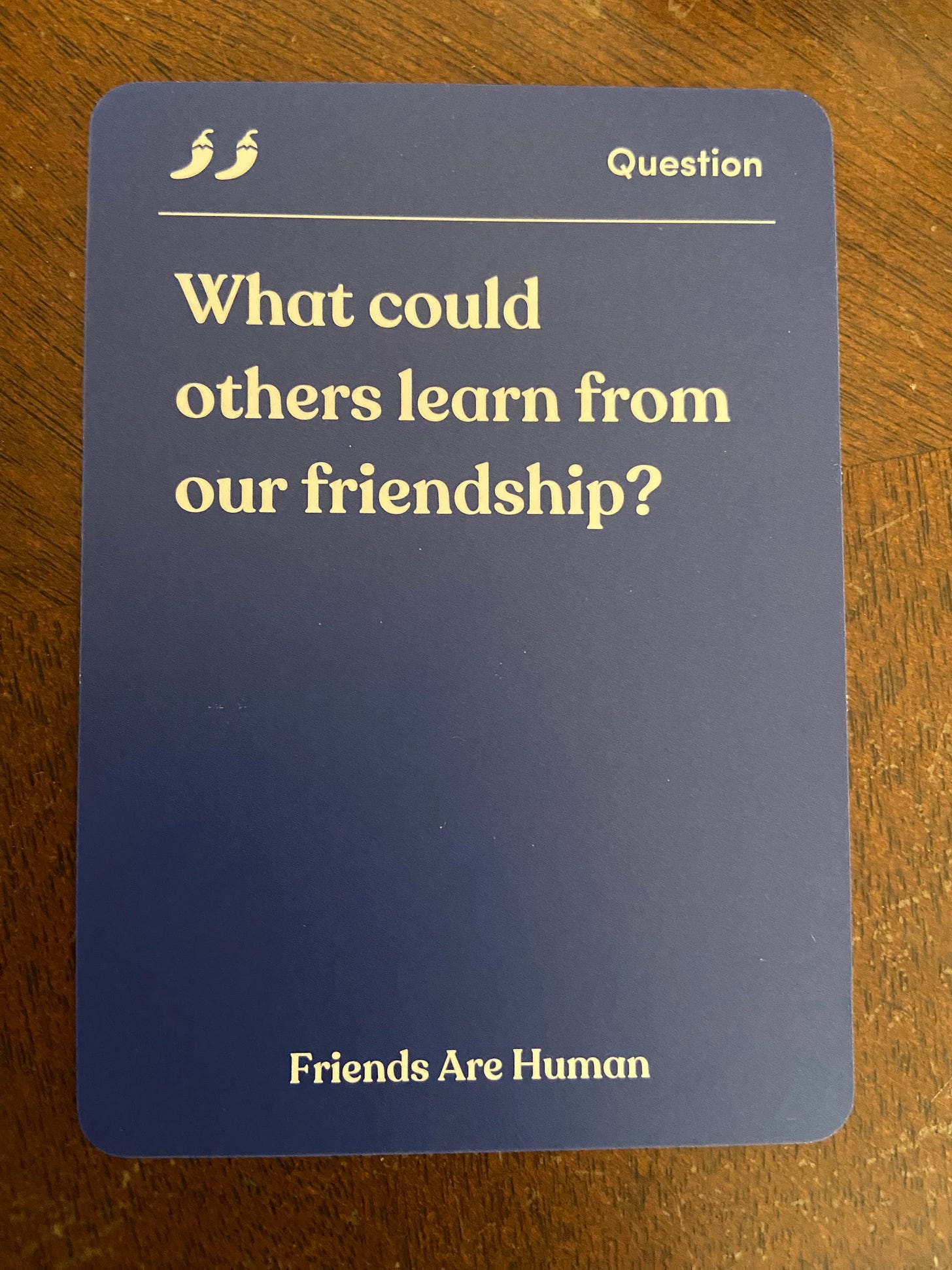 Sample card from Friends are Human deck. The card says: "What could others learn from our friendship?"