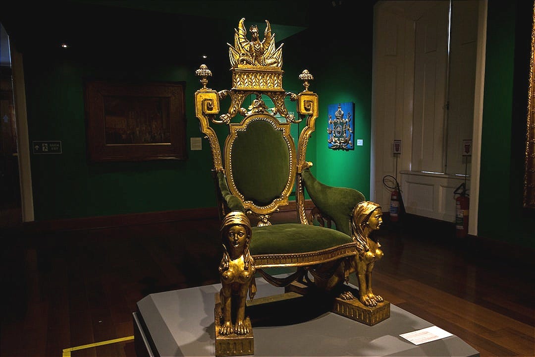 gold and green armchair