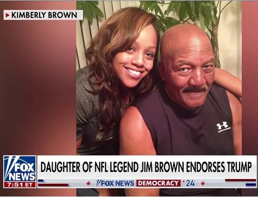 Kimberly Brown, daughter of NFL legend Jim Brown, with her father in a warm, supportive embrace.