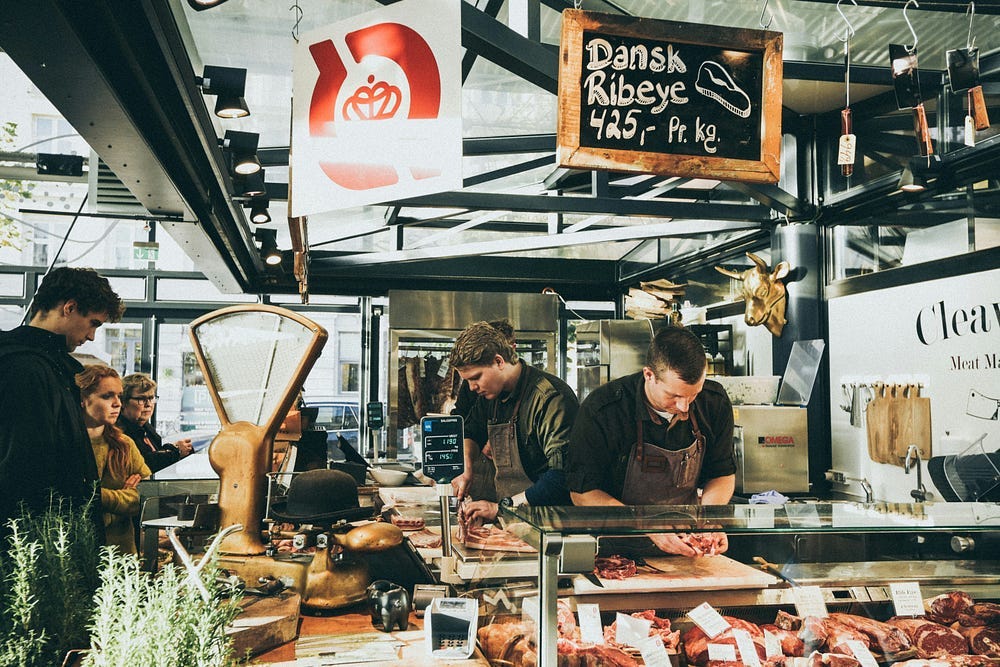 Photo of a butcher shop with good portions of fresh meat.