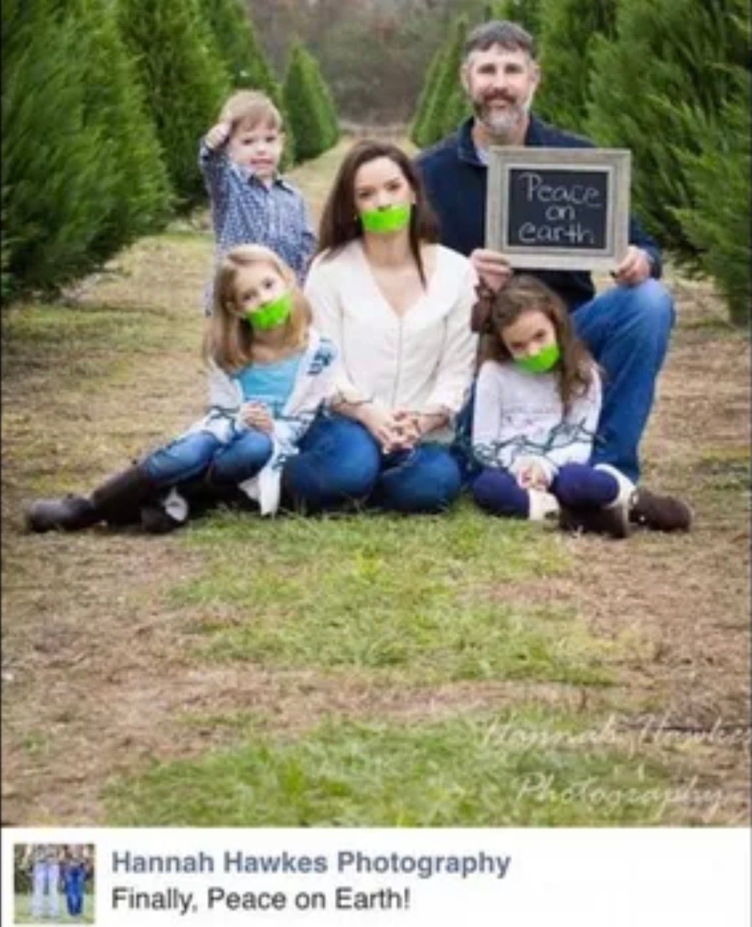 Christmas card with mom and daughters' mouths taped shut
