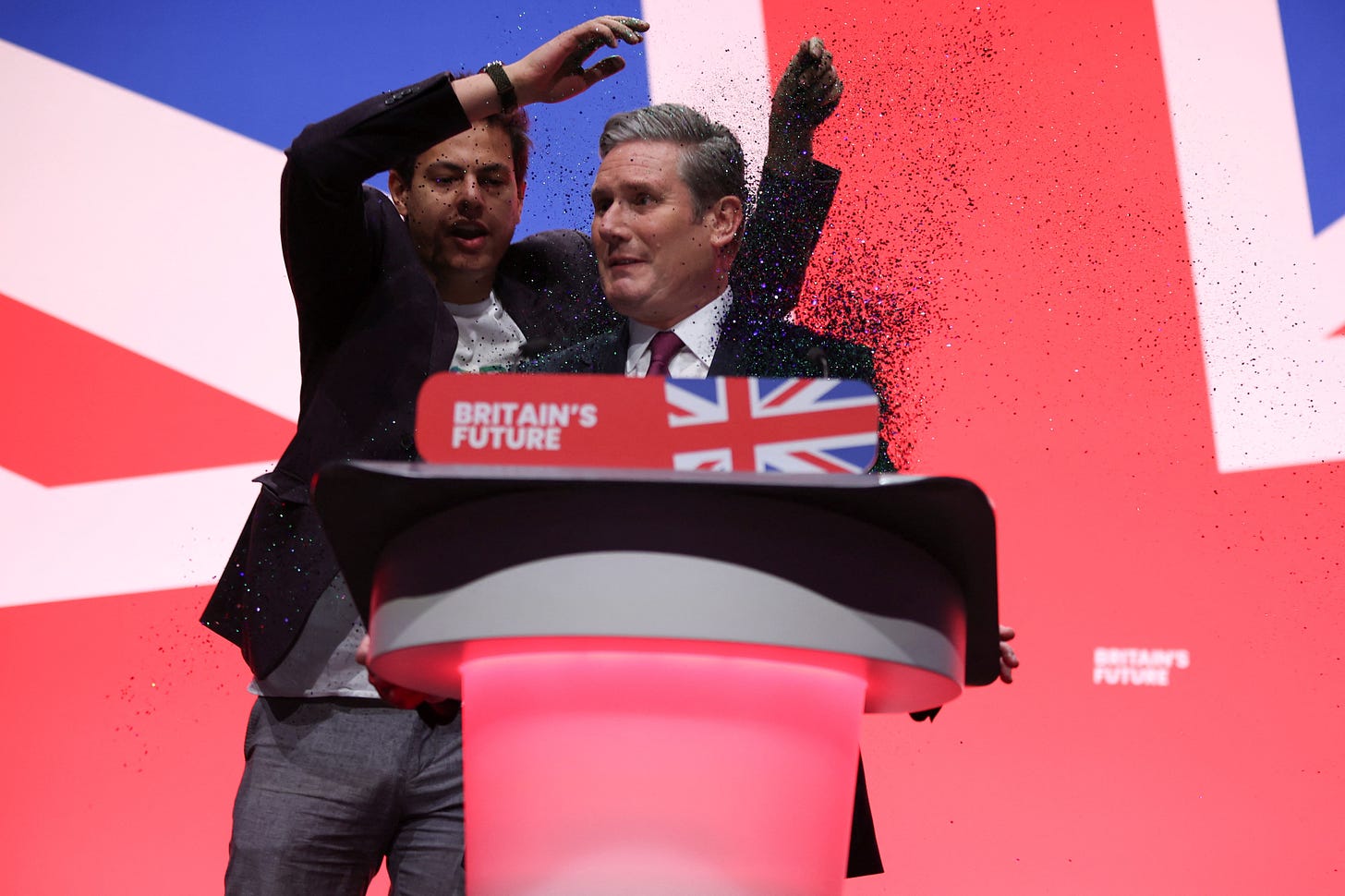 Revealed: Why stage invader glitterbombed Keir Starmer | The Independent