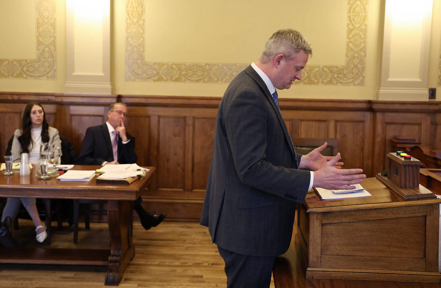 Jason Ravnsborg, former attorney general of South Dakota, speaks during a hearing about the future of his law license on Feb. 14, 2024, at the Capitol in Pierre while his legal team looks on. (David Bordewyk/SD NewsMedia Association)