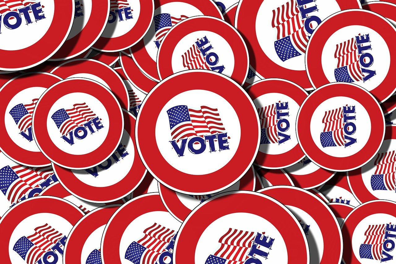 stickers with the american flag and word 'vote'