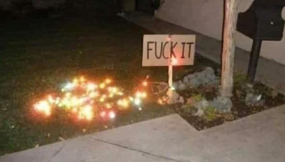 May be an image of lighting, fire, welcome mat, flower and text that says 'FUCK IT'