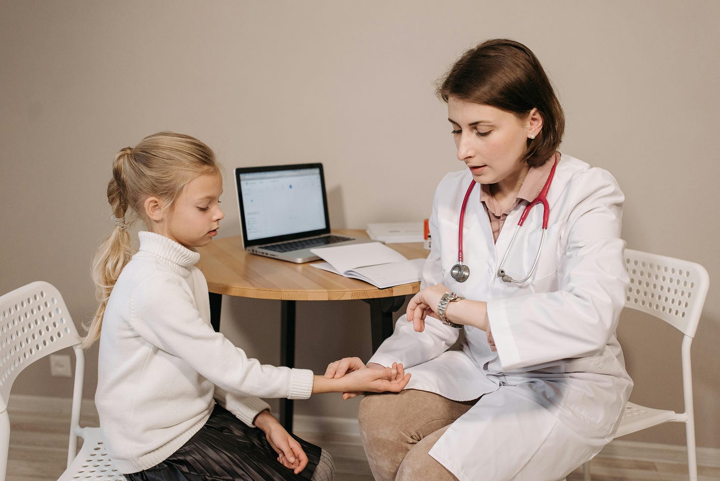 A Doctor Examining a Child Patient · Free Stock Photo