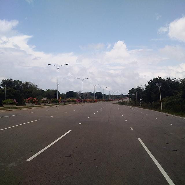 The virtually empty road leading to the virtually empty airport. Image: Wade Shepard