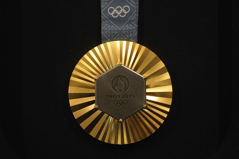 2024 Paris Olympics medals unveiled - and they're embedded with actual  pieces of the Eiffel Tower | Euronews