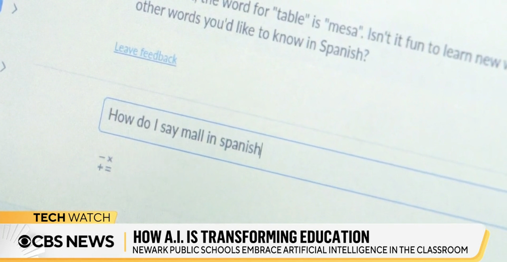 An image of a newscast. The headline is "How AI is transforming education." A student has typed in the question "How do I say mall in spanish" into Khanmigo.