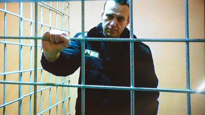 Alexei Navalny behind bars in January last year