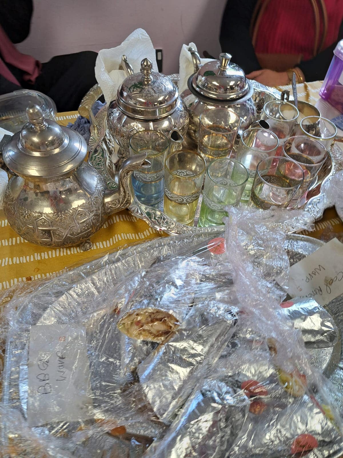 silver ornate Arabic teapor and glasses, BBQ chicken wraps