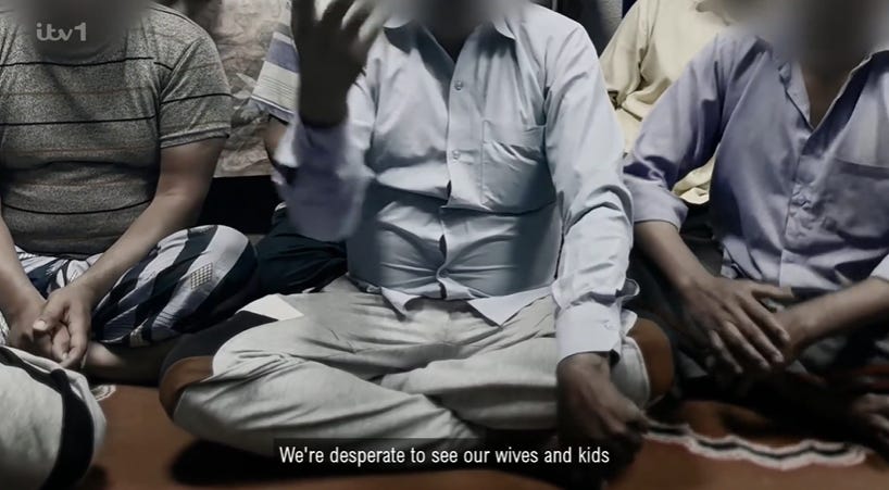 Screen grab from the documentary, hiding faces of the migrants to protect their identities. This section has a man saying that they are desperate to see their wives and kids.