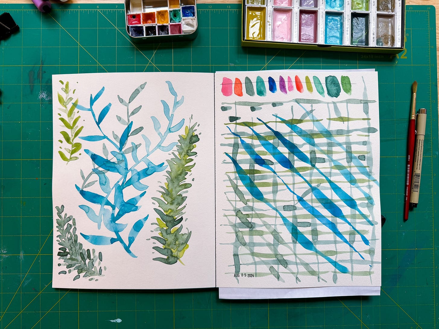 sketchbook spread of loose botanical leaves and practice lines