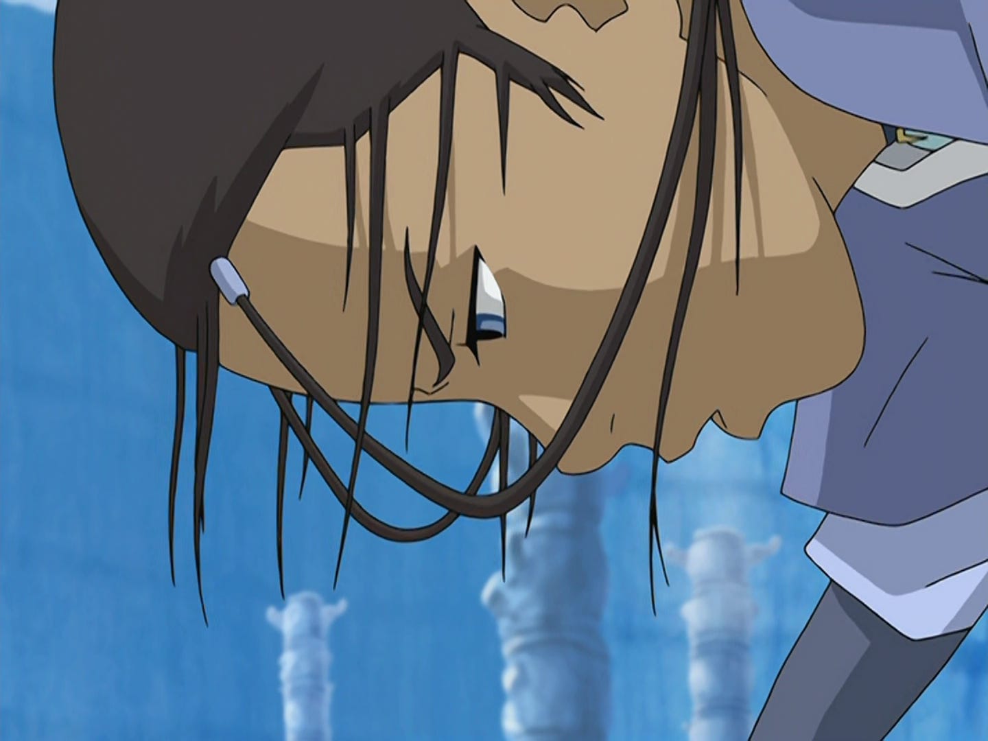 In the North Pole, Katara crouches on the ground, her hair a mess, breathing heavily.