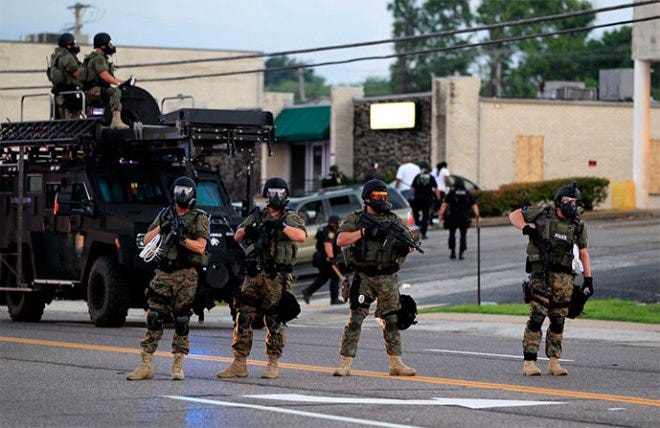 military-police-ferguson camo masks guns up