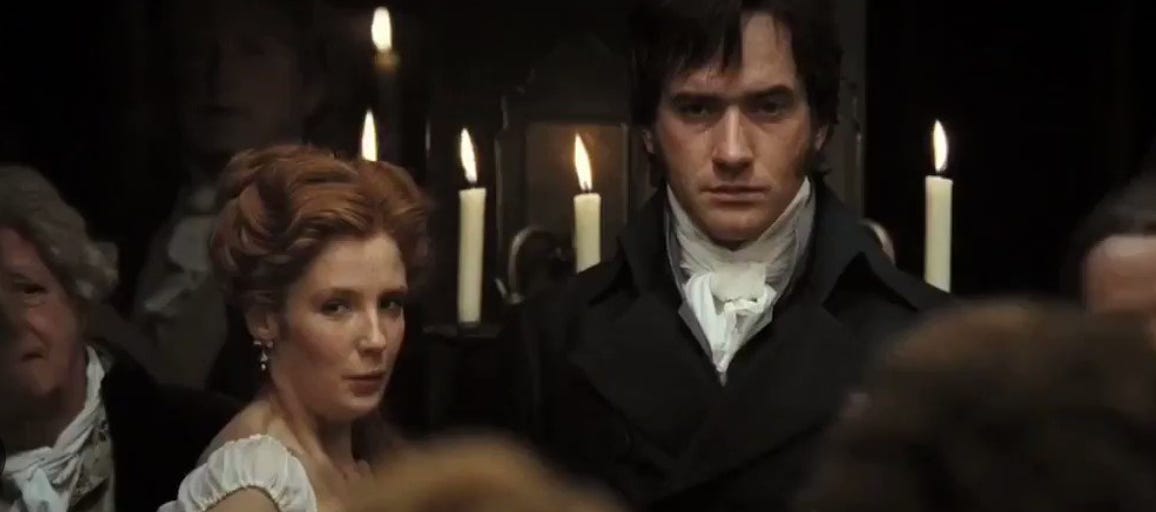 Caroline Bingley trying to conspire with Darcy at a Hertfordshire assembly in Joe Wright's 2005 adaptation. 
