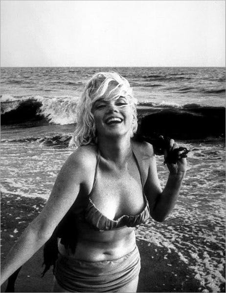 Black and white photograph of Marilyn on the beach