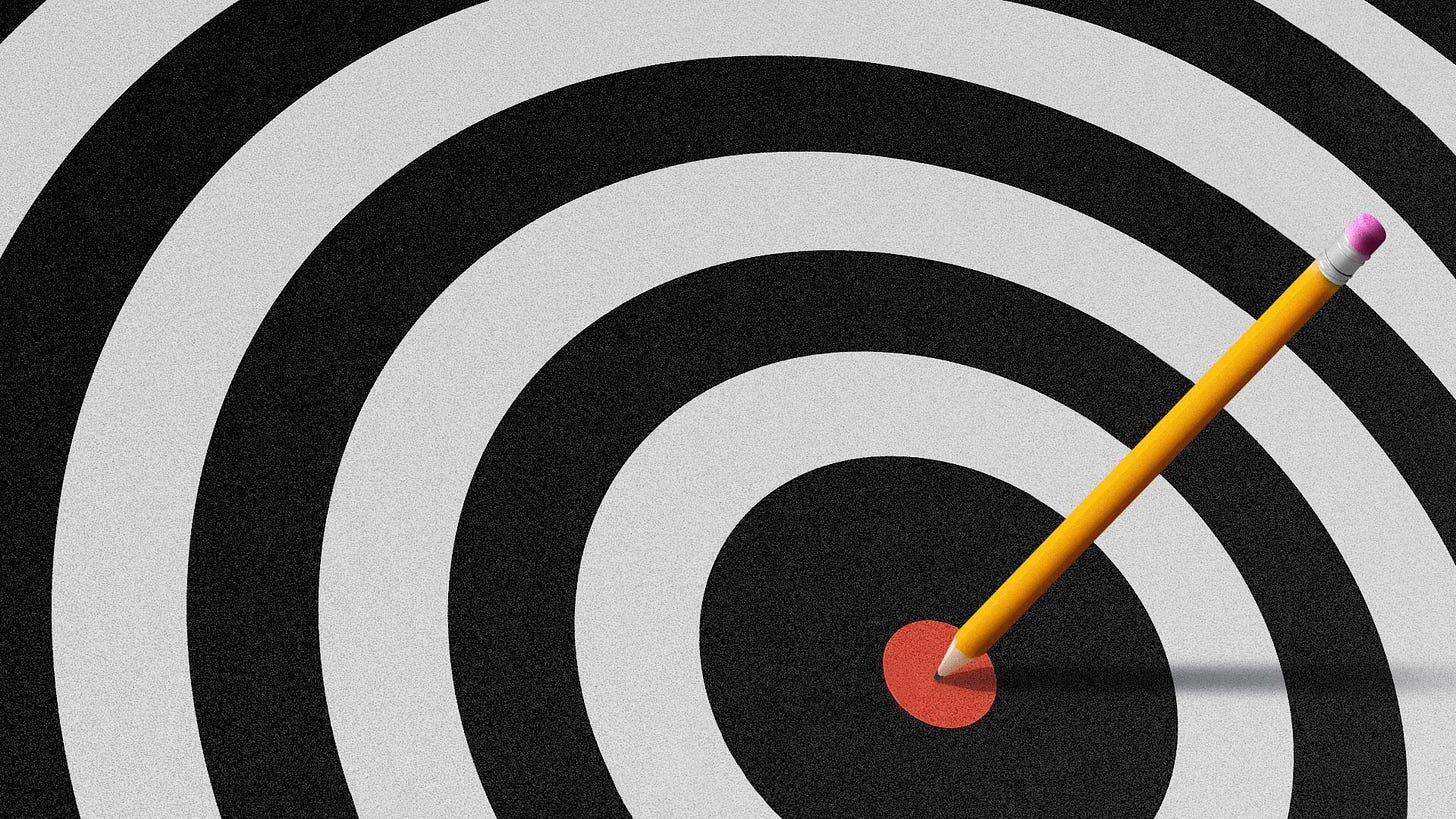 Illustration of a pencil hitting the bullseye of a target. 