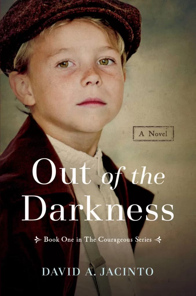 Out of the Darkness cover. A young boy wearing a mining cap and rustic clothes looks out at the reader. The title is in white, and the author's name is in a light blue.