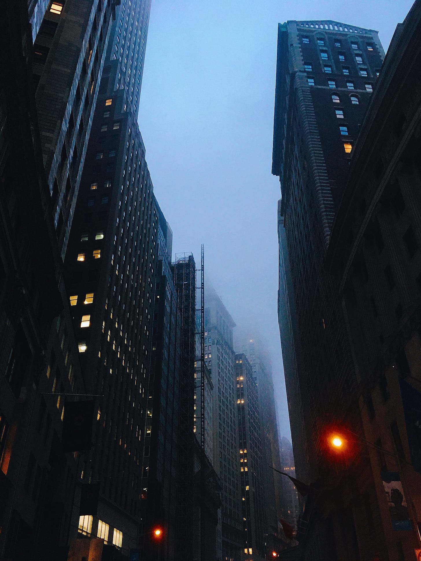 Financial District buildings looming in fog.