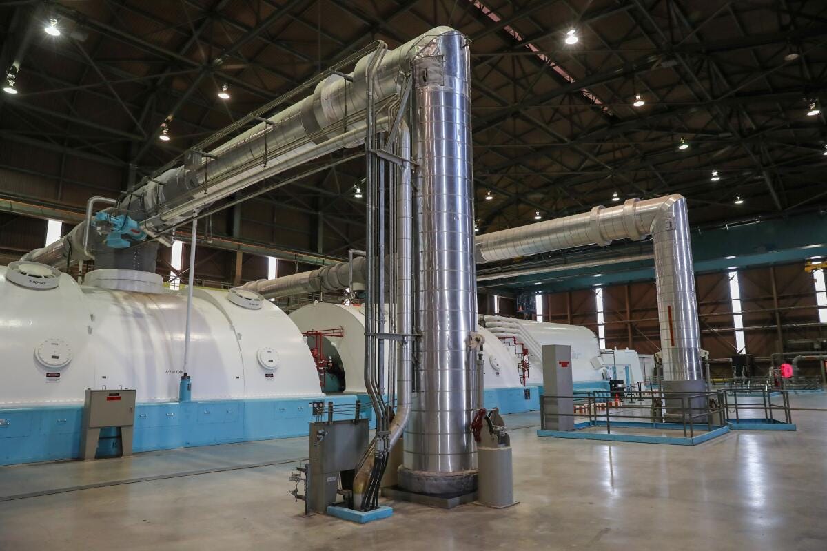 A giant generator inside a nuclear power plant.