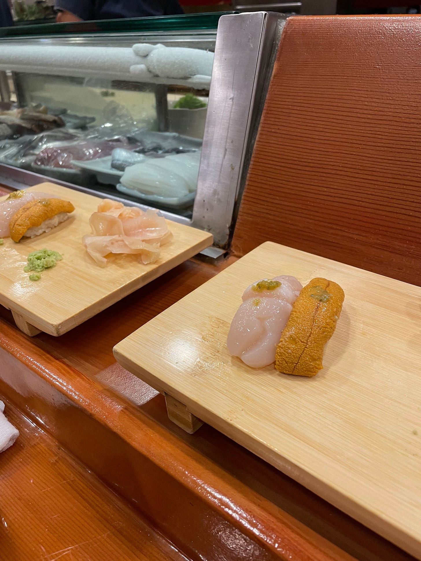 Scallop and uni nigiri at Sushi Gen