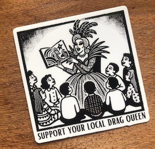 black and white sticker showing a Drag Queen reading to kids and the text Support Your Local Drag Queen