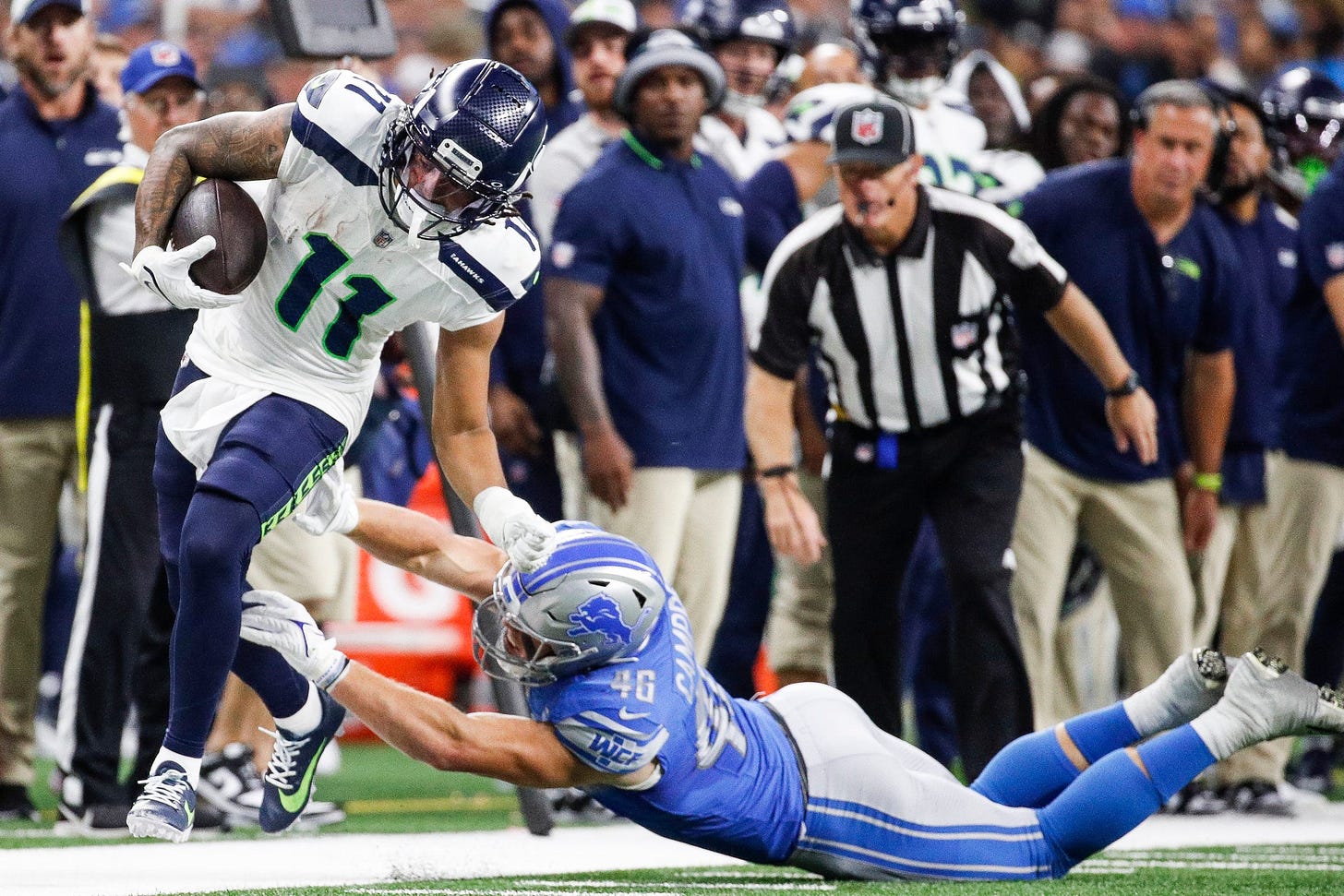 Sep 17, 2023; Detroit, Michigan, USA; Detroit Lions linebacker Jack Campbell (46) tackles Seattle Seahawks wide receiver Jaxon Smith-Njigba (11) during the second half at Ford Field. Mandatory Credit: Junfu Han-USA TODAY Sports