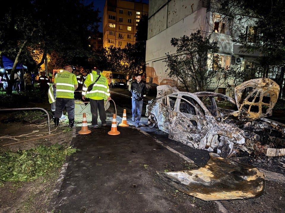 Burned-out car at the site of a Russian drone strike in Kharkiv, Ukraine.